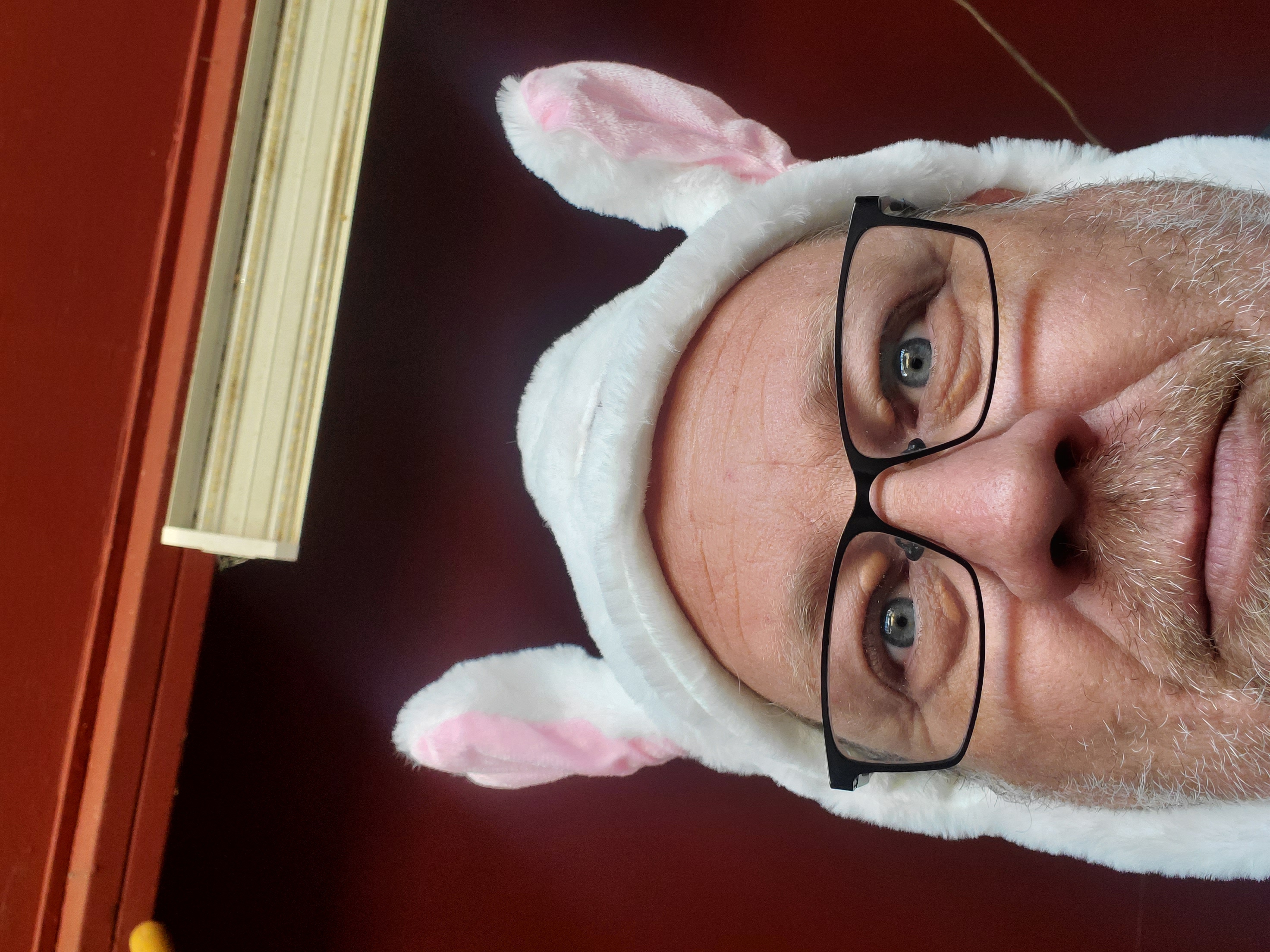 Clayton Loban wearing bunny ears at family gathering.